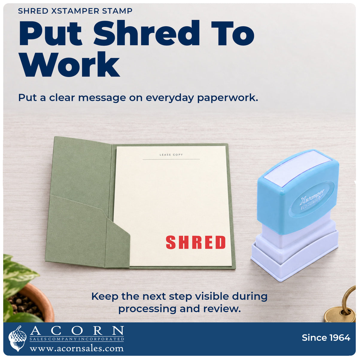 Shred Stamp being pressed to leave an imprint reading "Shred"