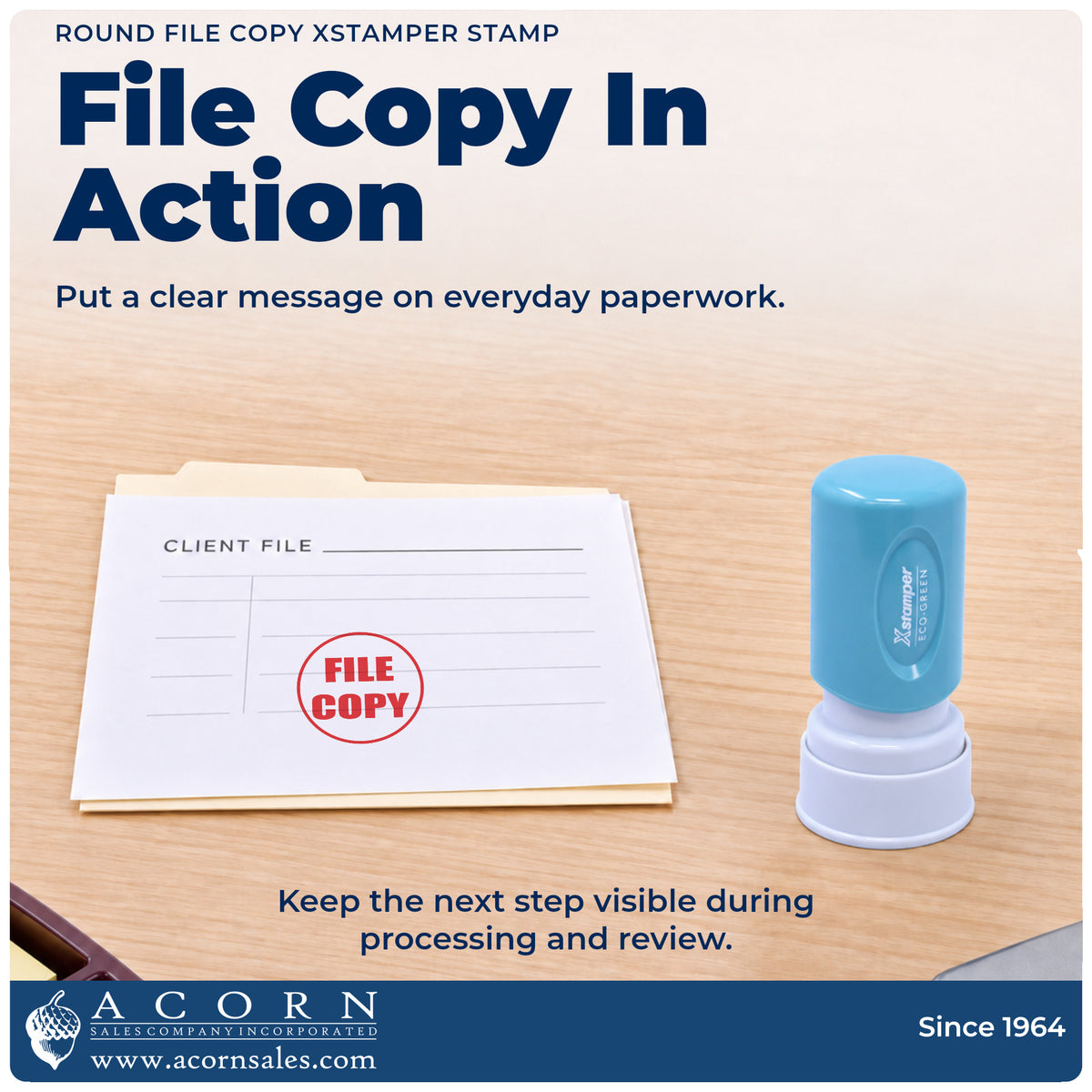 Round File Copy Stamp being pressed to leave an imprint reading "File copy"