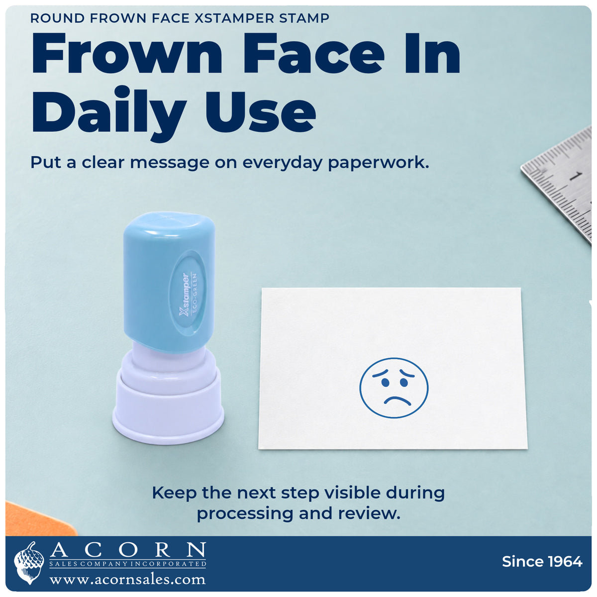 Round Frown Face Stamp being pressed to leave an imprint reading "Frown face"