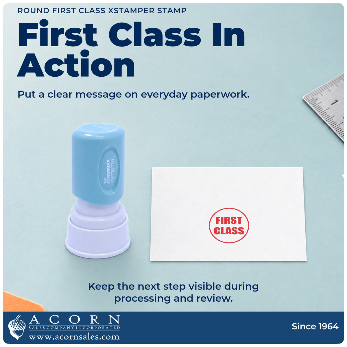 First Class Stamp – Round Pre-Inked Xstamper being pressed to leave an imprint reading "First class"