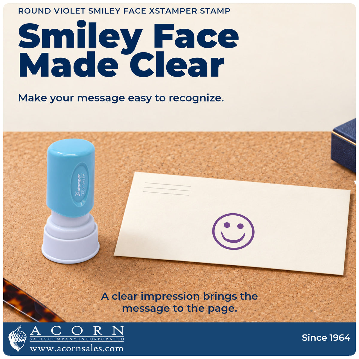 "Smiley face" imprint on office paperwork beside the Xstamper Smiley Face Stamp – Round Violet Pre-Inked