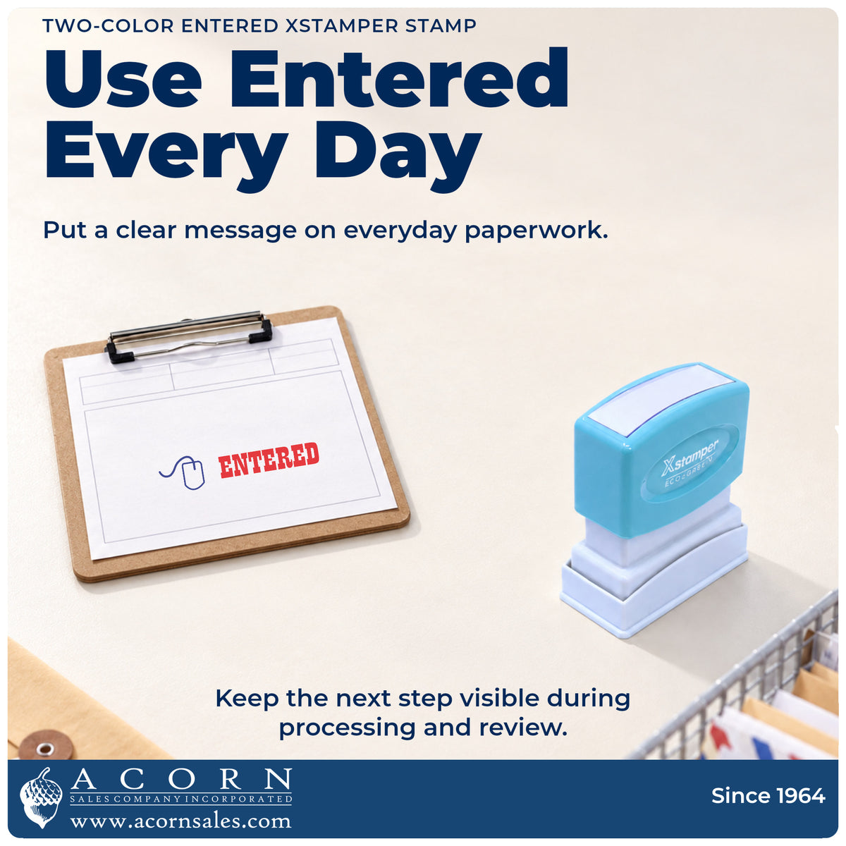 Two-Color Entered Stamp being pressed to leave an imprint reading "Entered"