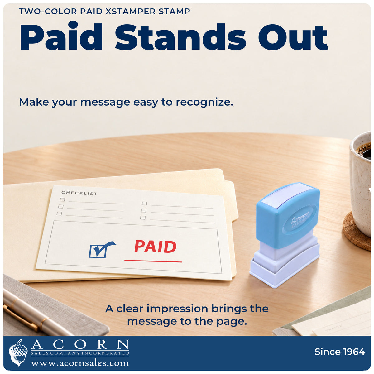 "Paid" imprint on office paperwork beside the Two-Color Paid Stamp