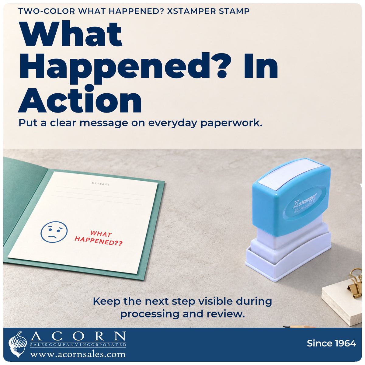 Two-Color What Happened? Stamp being pressed to leave an imprint reading "What happened?"