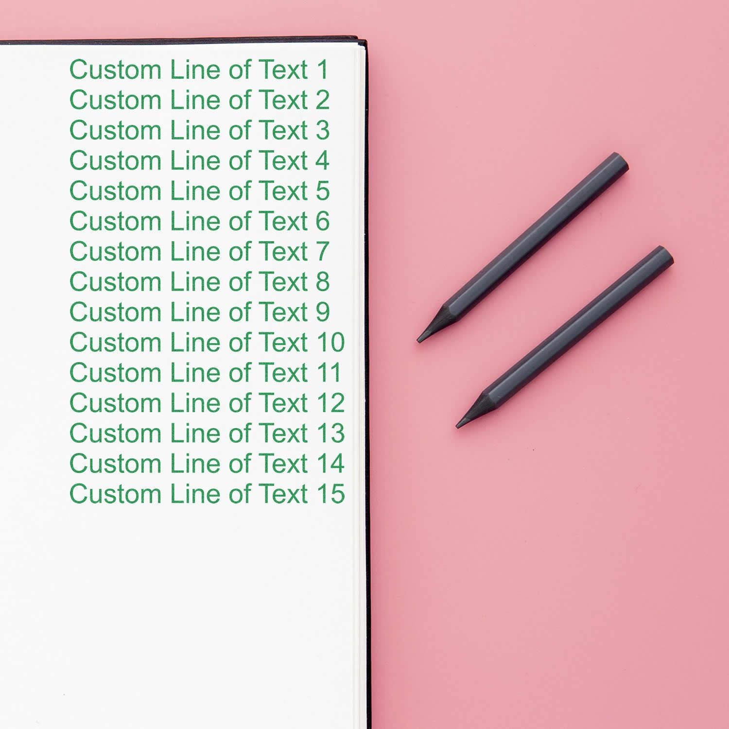 Mobile notes template with custom text lines 115 and two pens on pink background for writing and documentation.