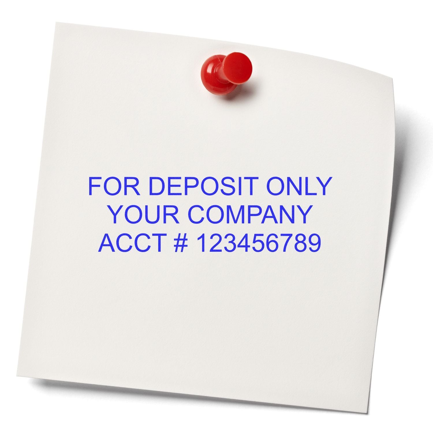 Close-up of a pinned “For Deposit Only” business check endorsement note with company account number on white paper.