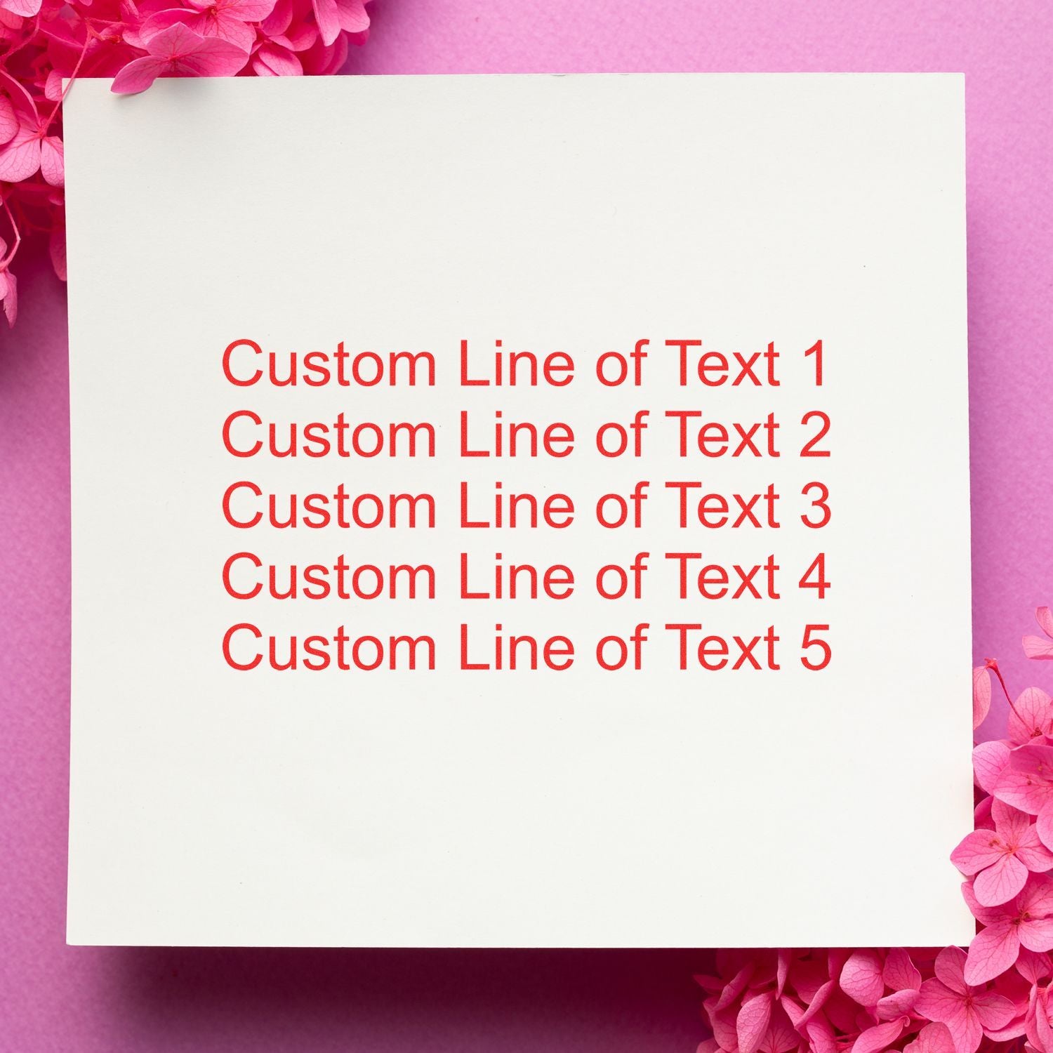 Pink floral background with white card showing five custom text lines for branding, invitation or typography design template copy.