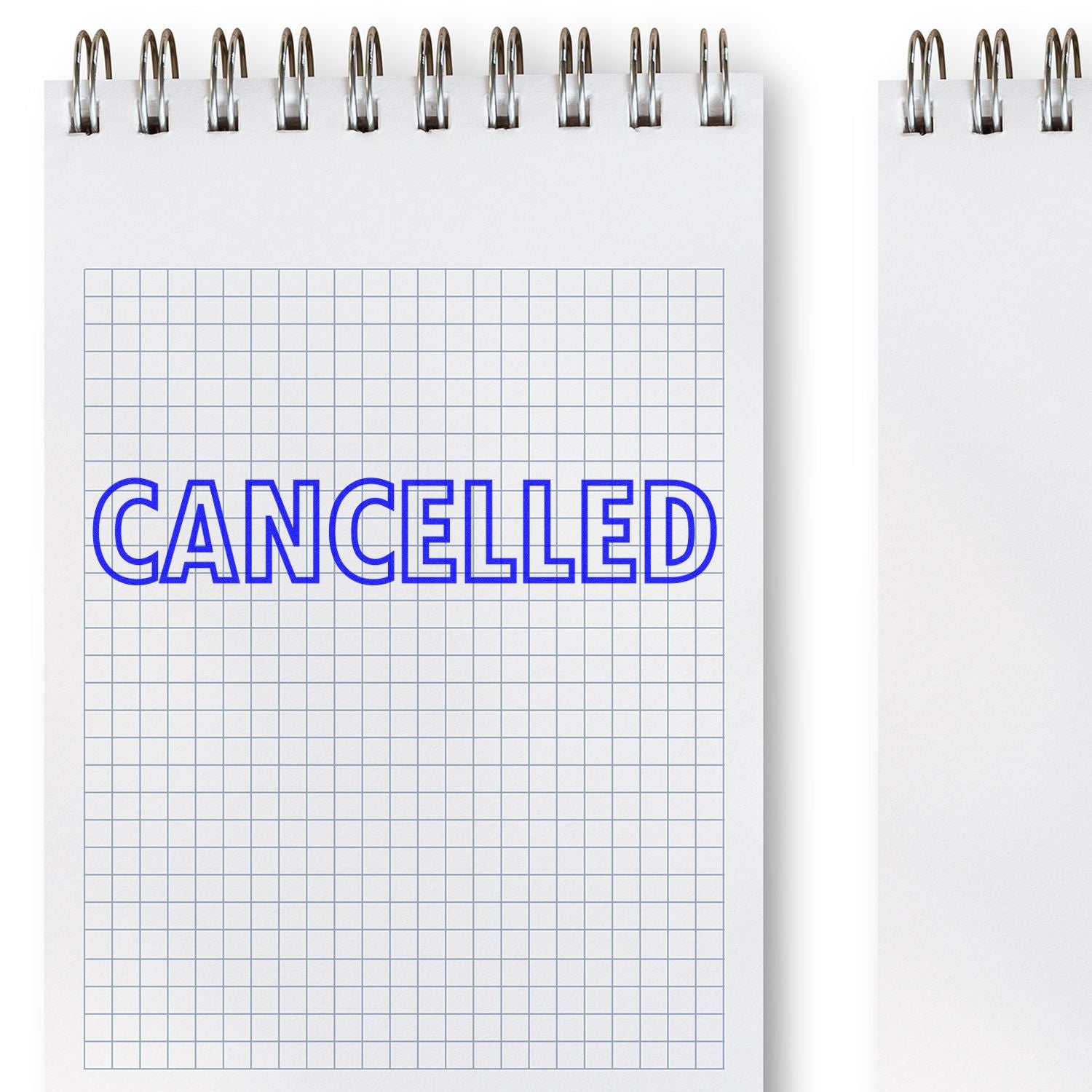 Graph paper notebook with CANCELLED text, showing a cancellation message for scheduling, events, or plans.