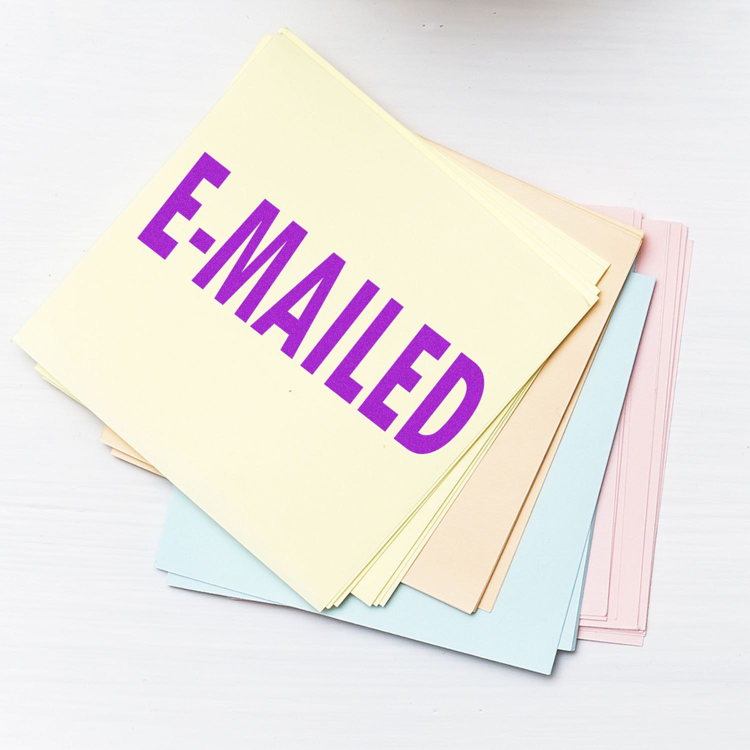 Pastel greeting cards stacked together with bold purple lettering, perfect for invitations, notes, and heartfelt messages.