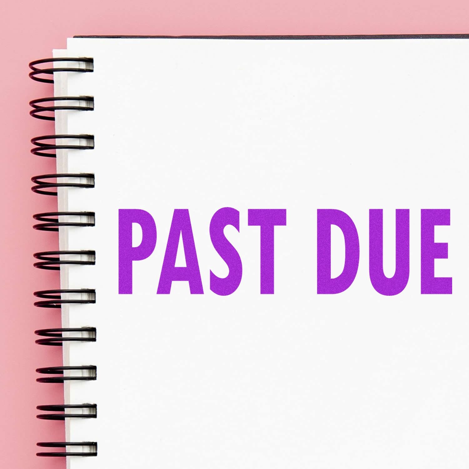 Past due notice on spiral notebook with purple text, highlighting overdue payments and billing reminders.