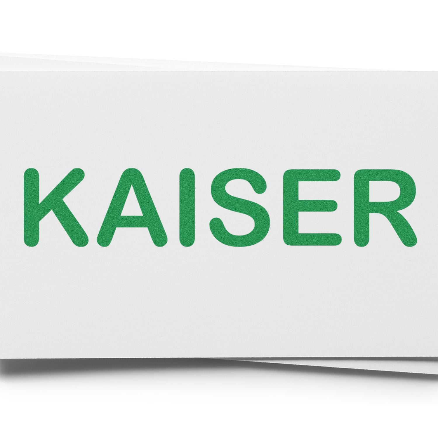 Green KAISER logo lettering on a white background, highlighting KAISER brand identity for services and products.