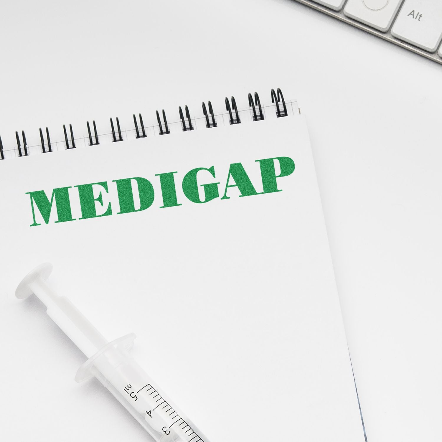 Medigap health insurance application with syringe on medical document, highlighting Medicare supplement coverage.