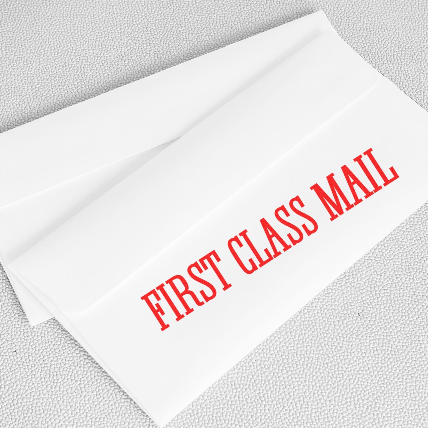 White shipping envelope with bold red MAIL branding on a textured background, representing delivery and mailing services.