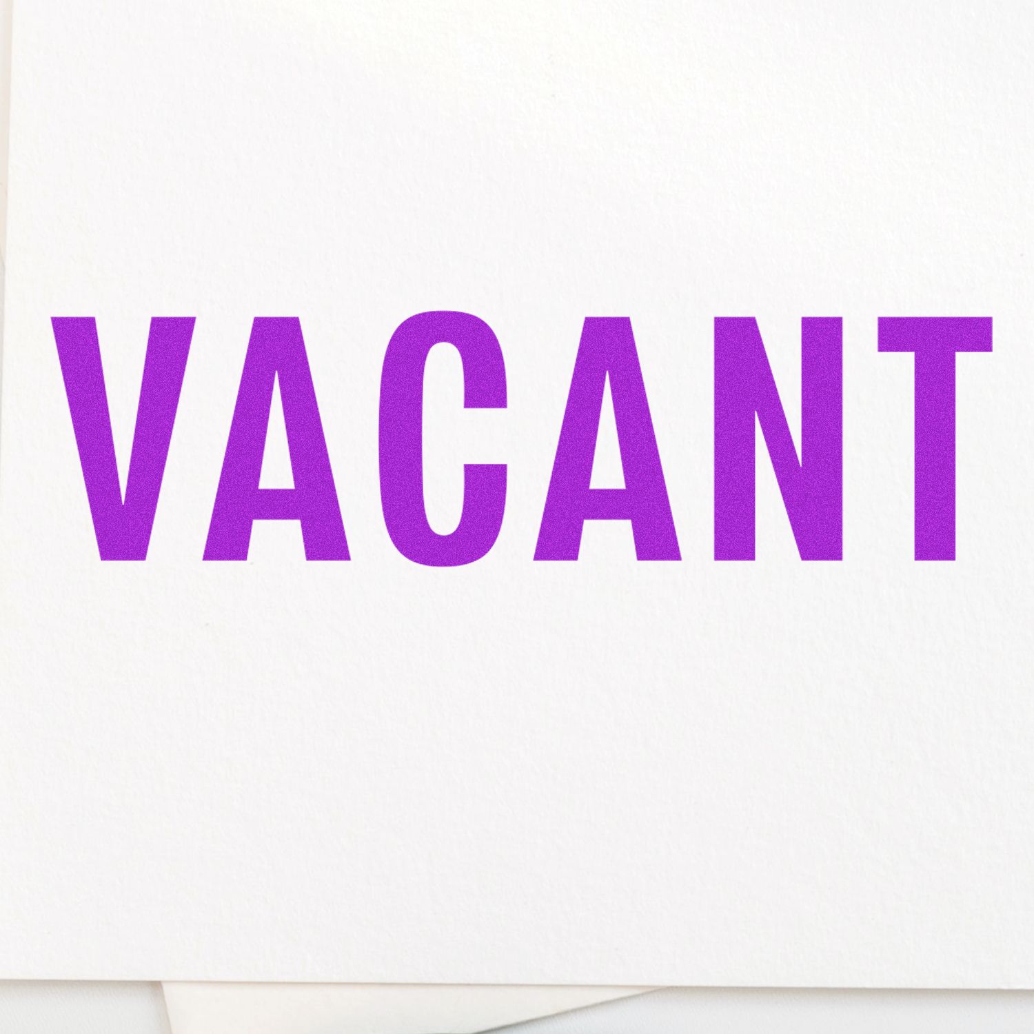 Purple VACANT text on white background, ideal for real estate vacancy listings and rental space availability pages.