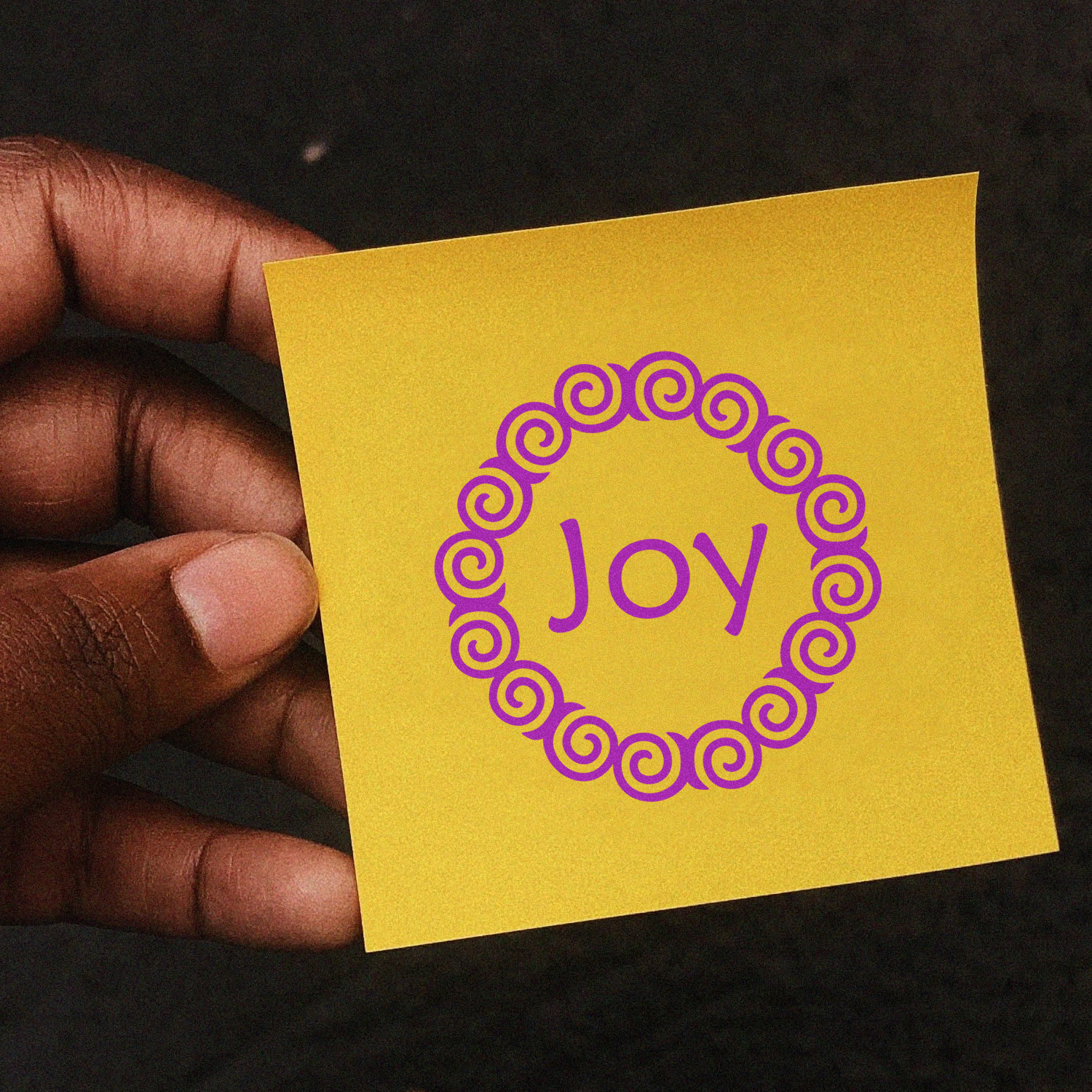 Joy decorative rubber stamp design on yellow card, perfect for handmade greeting cards and crafting.