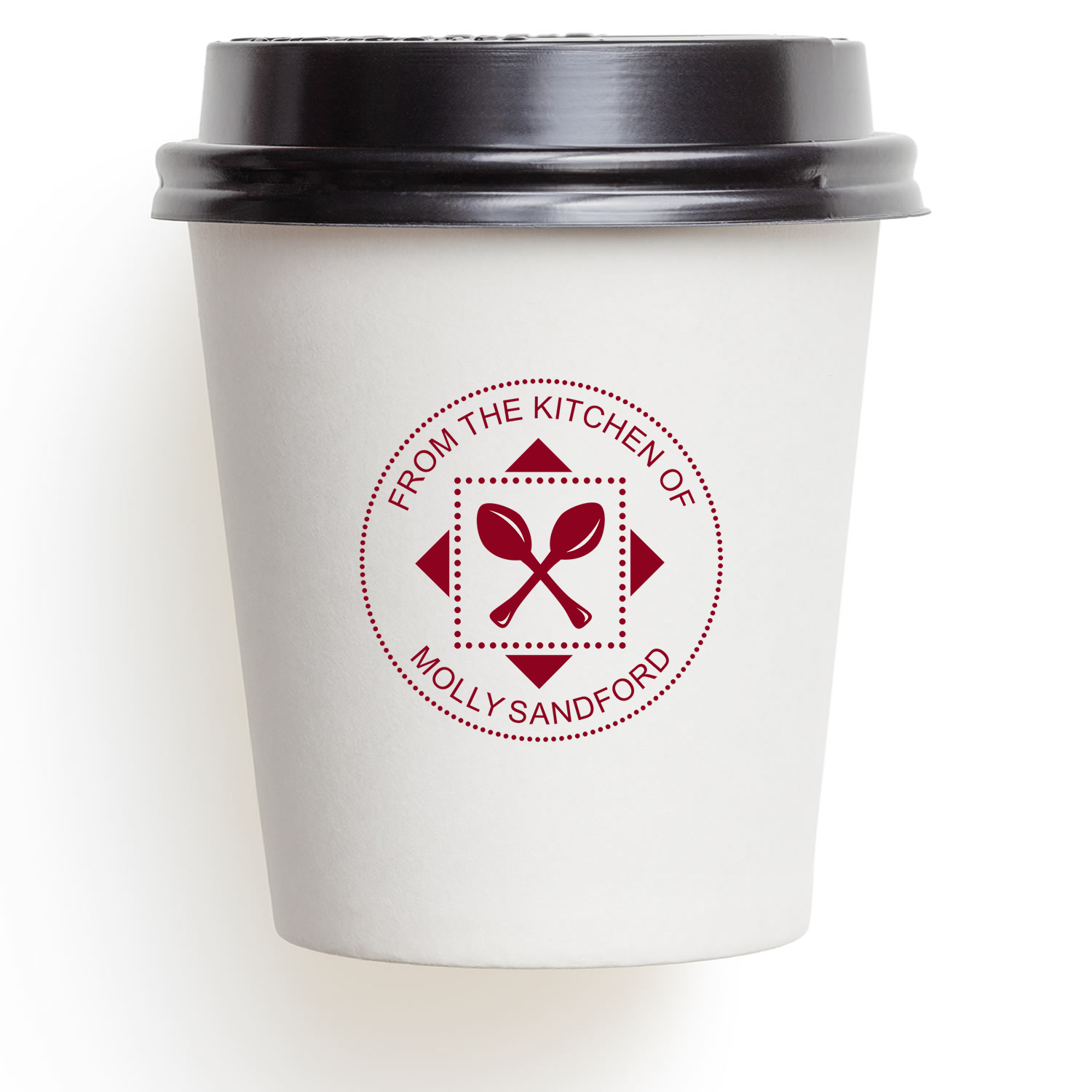 Custom rubber stamp logo on takeaway coffee cup for branded kitchen packaging, featuring From the Kitchen of Molly Sandford.