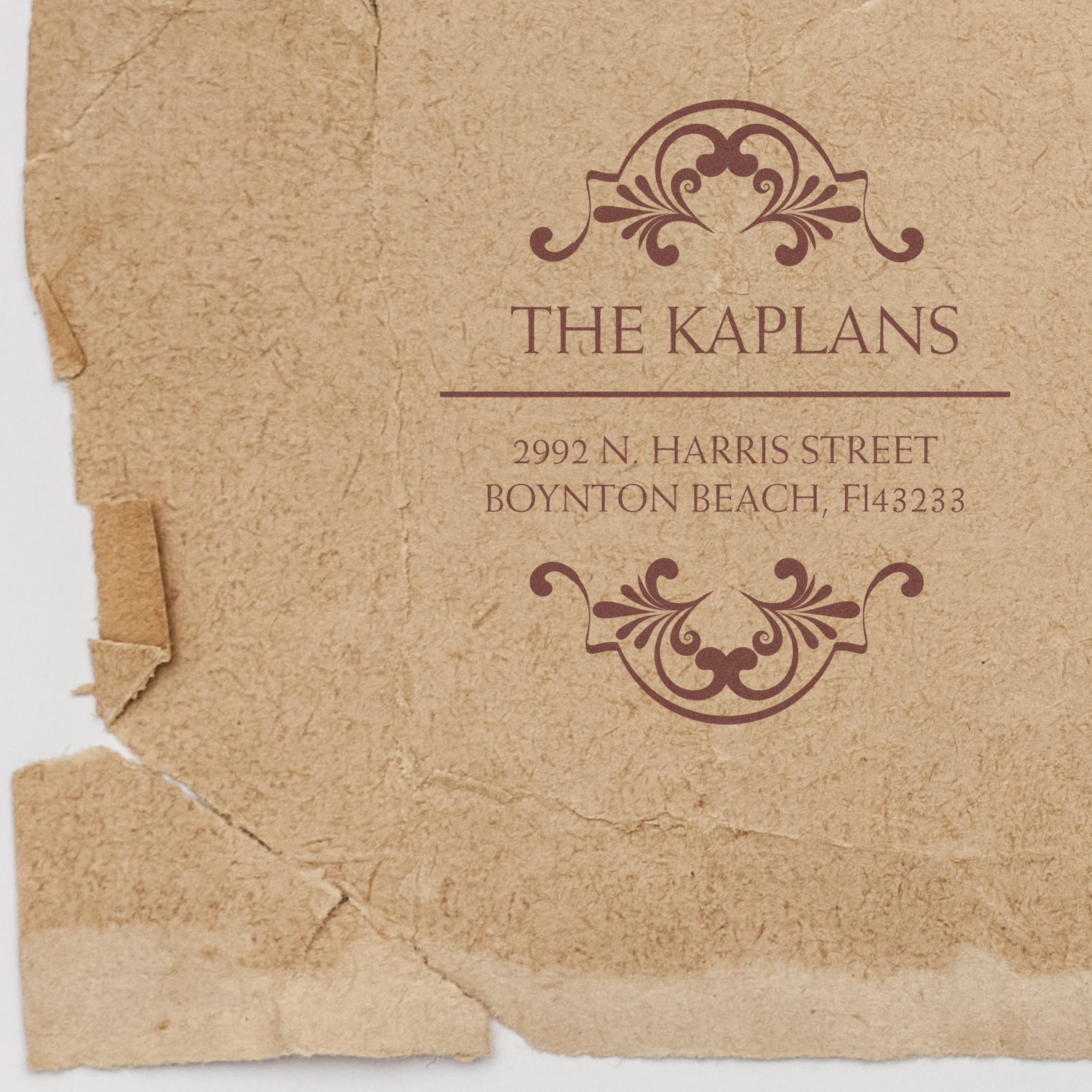 Custom return address rubber stamp for The Kaplans with ornate vintage monogram design for envelopes and wedding stationery.