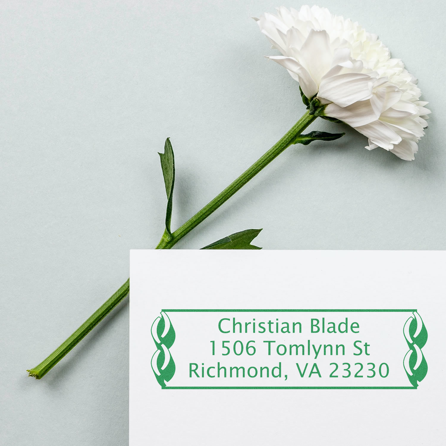 Custom floral return address rubber stamp with green border, personalized for Christian Blade, Richmond, VA 23230.
