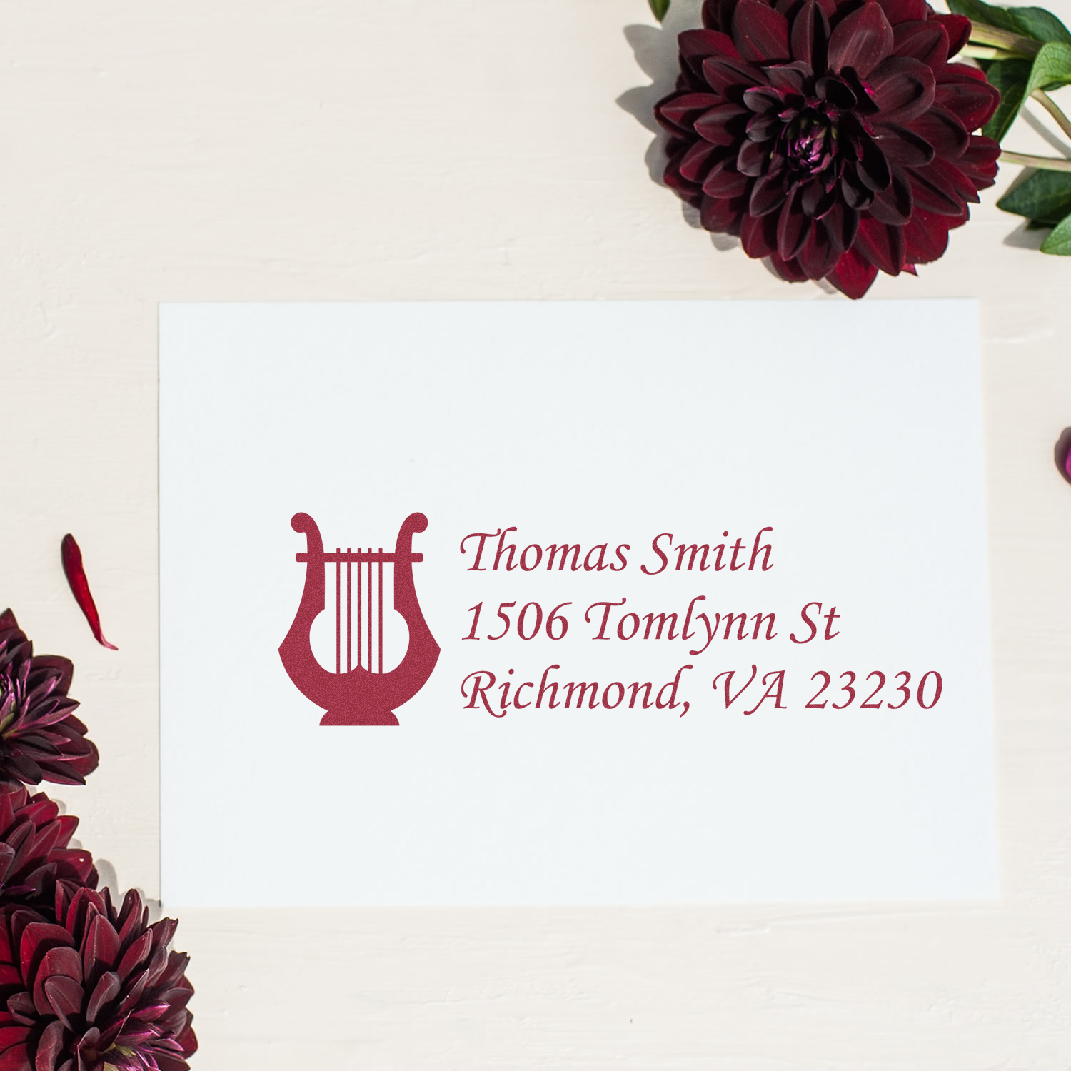Custom rubber address stamp with harp design and Thomas Smith Richmond, VA address for invitations and stationery.