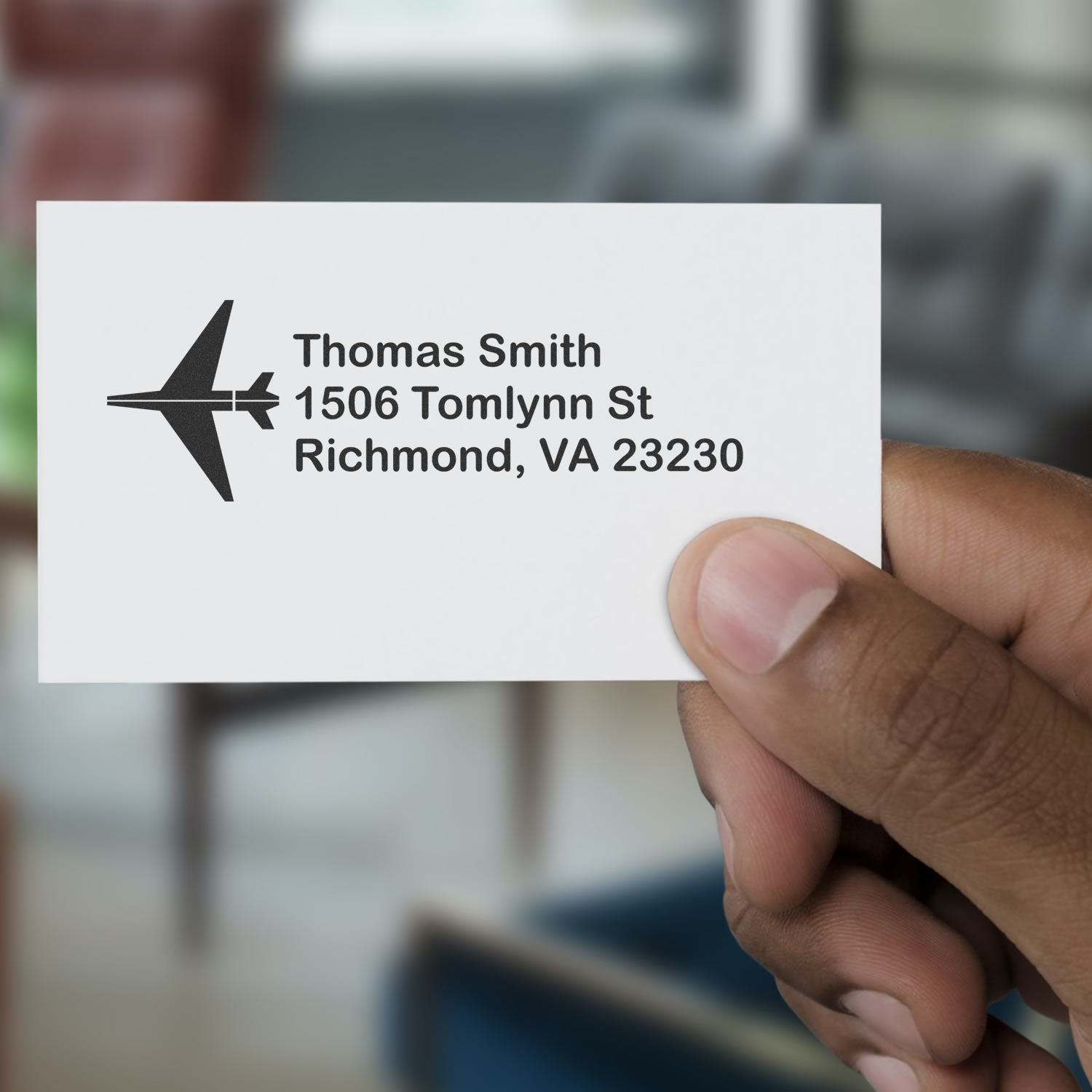 Custom return address rubber stamp with airplane logo for Thomas Smith, Richmond, VA 23230
