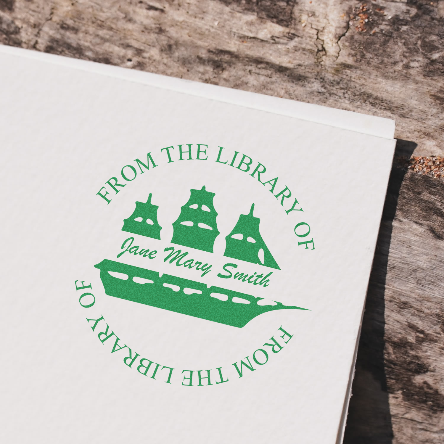 Green bookplate label on a white page reading From the Library of Jane May Smith, for identifying a library book.
