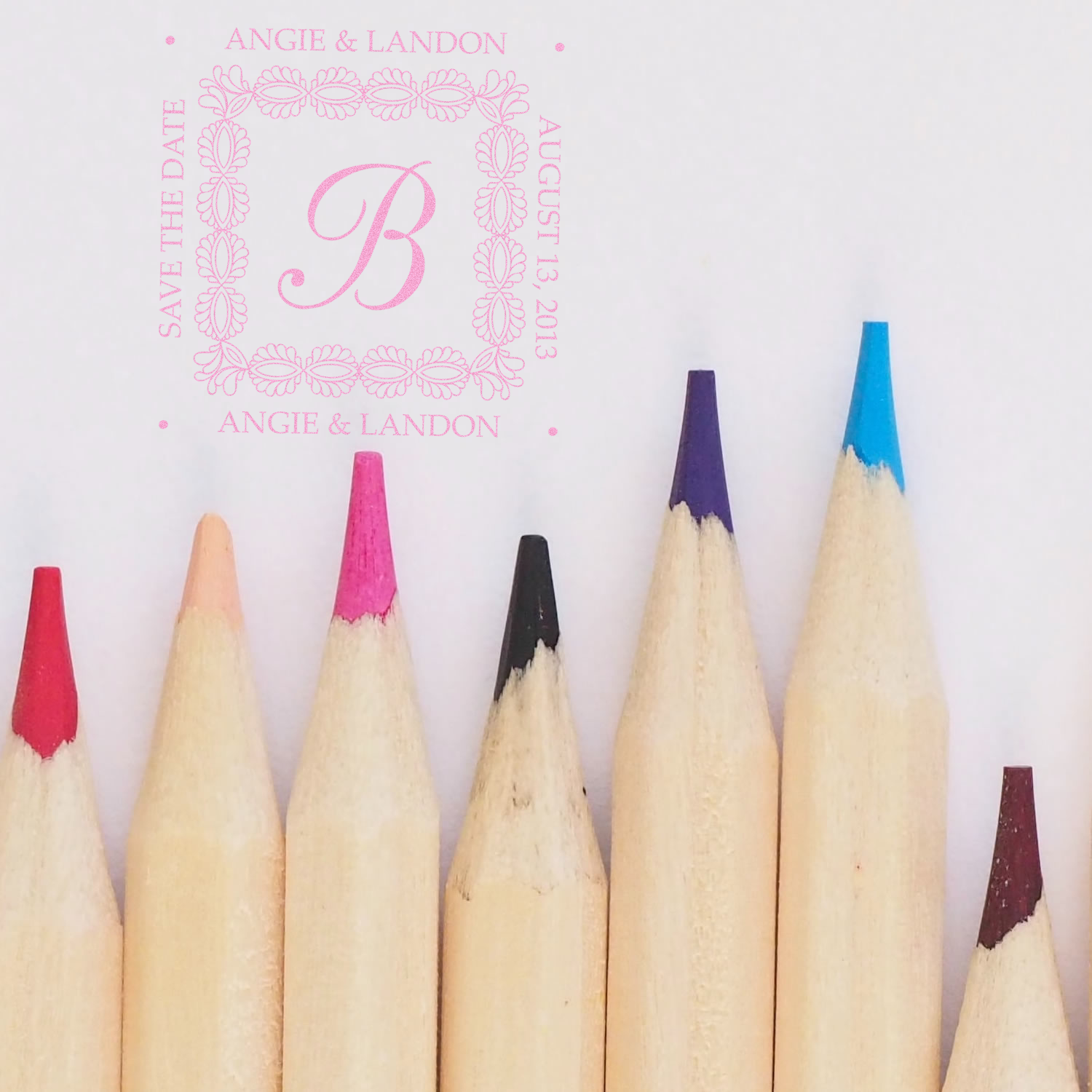 Custom wedding monogram rubber stamp with floral border, Angie & Landon names, and Save the Date August 13, 2013 design.