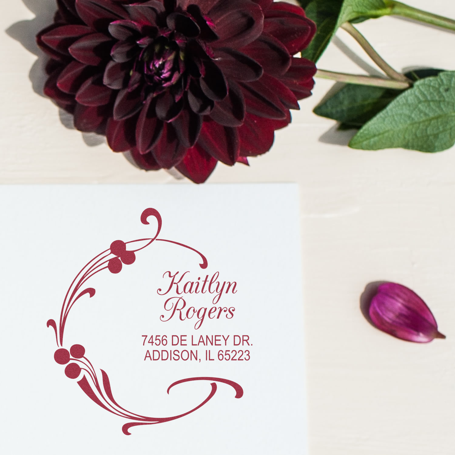 Personalized floral return address rubber stamp with burgundy wreath for Kaitlyn Rogers, Addison, IL.