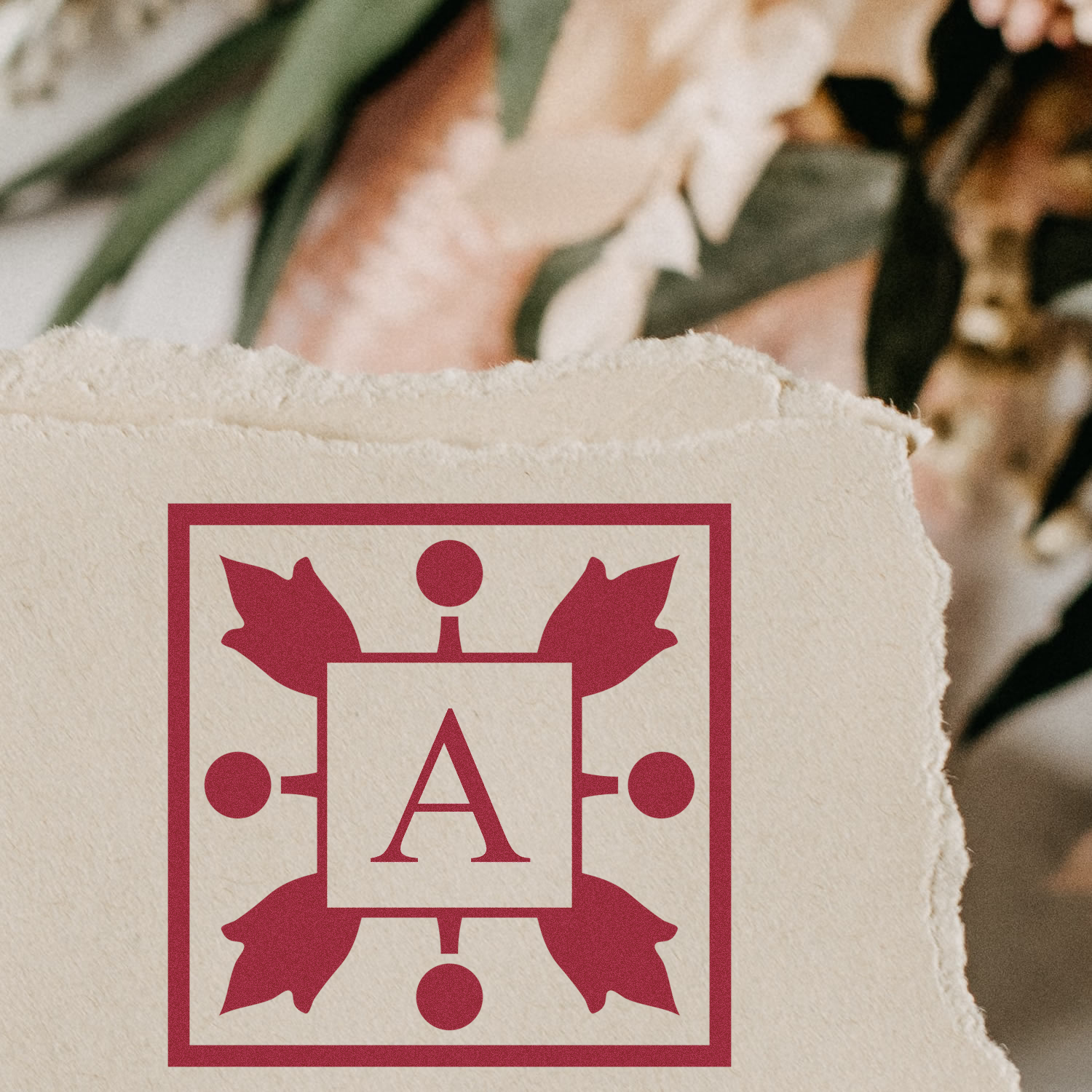 Custom monogram rubber stamp with letter A for branded stationery, invitations, and personalized paper goods