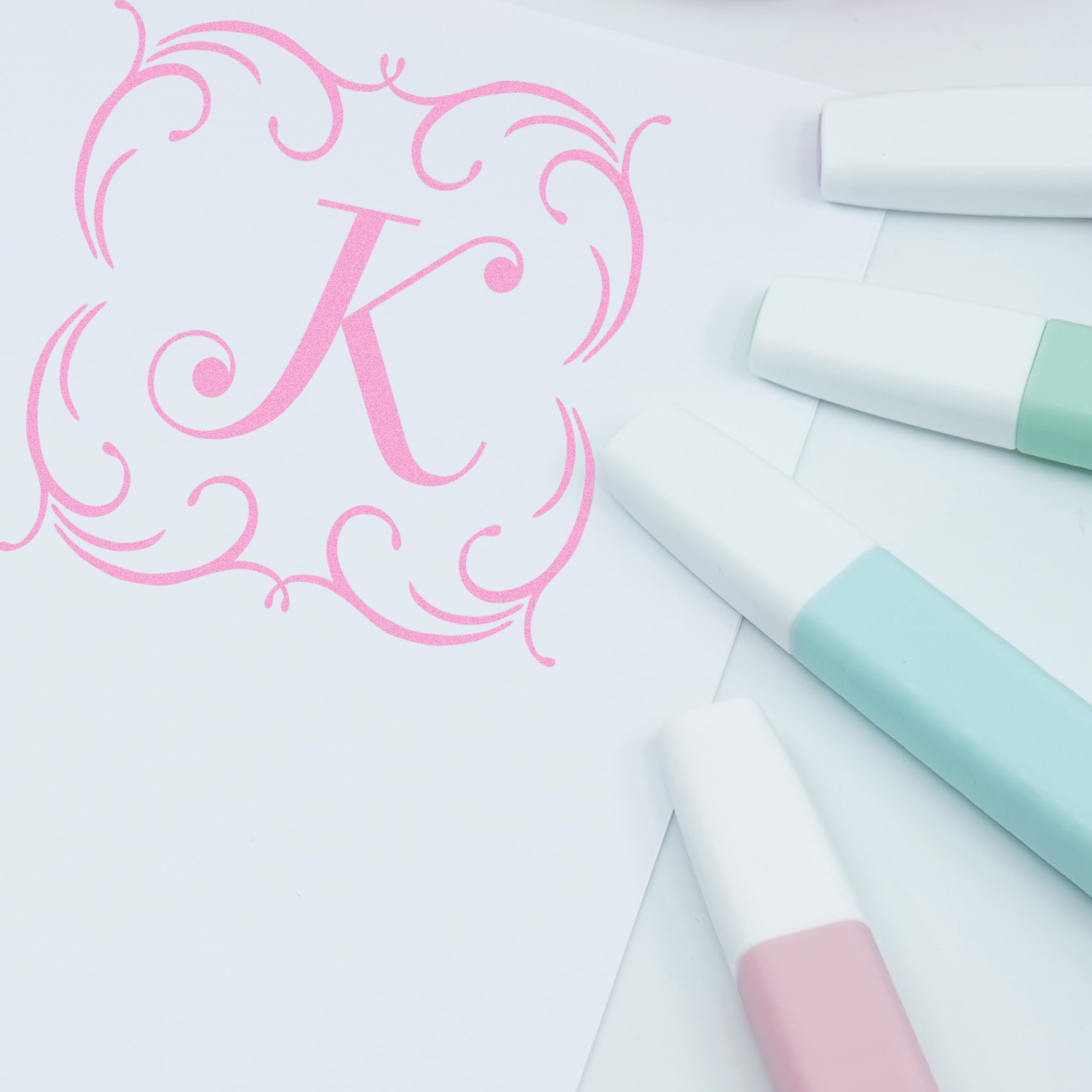 Ornate pink monogram K rubber stamp for personalized stationery, wedding favors, and craft branding.