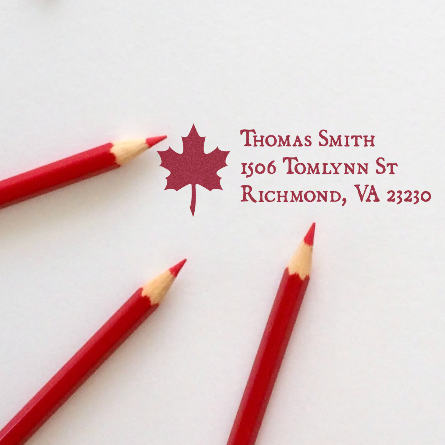 Custom return address rubber stamp with maple leaf logo for Thomas Smith, Richmond, VA 23230.
