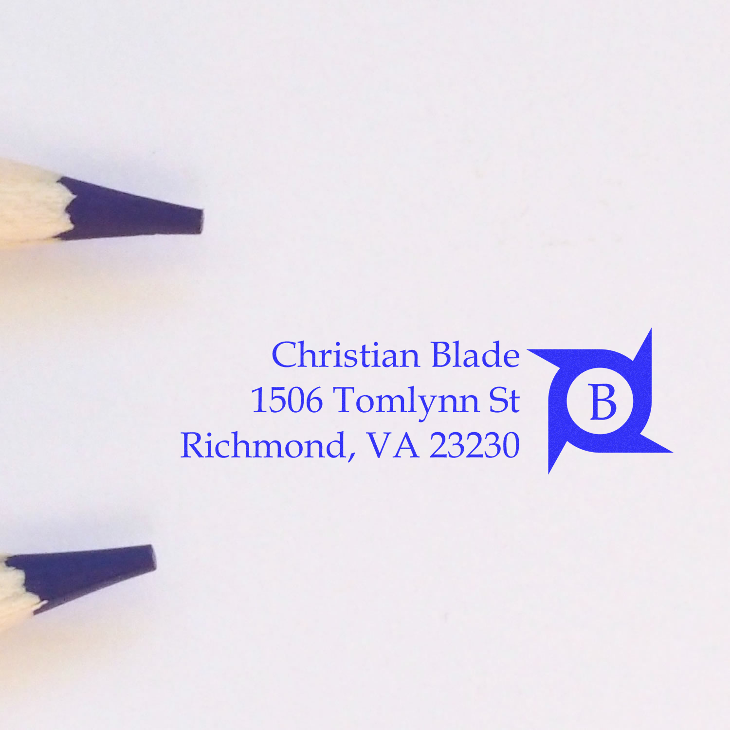 Blue custom address rubber stamp proof for Christian Blade, Richmond, VA 23230, on white paper.