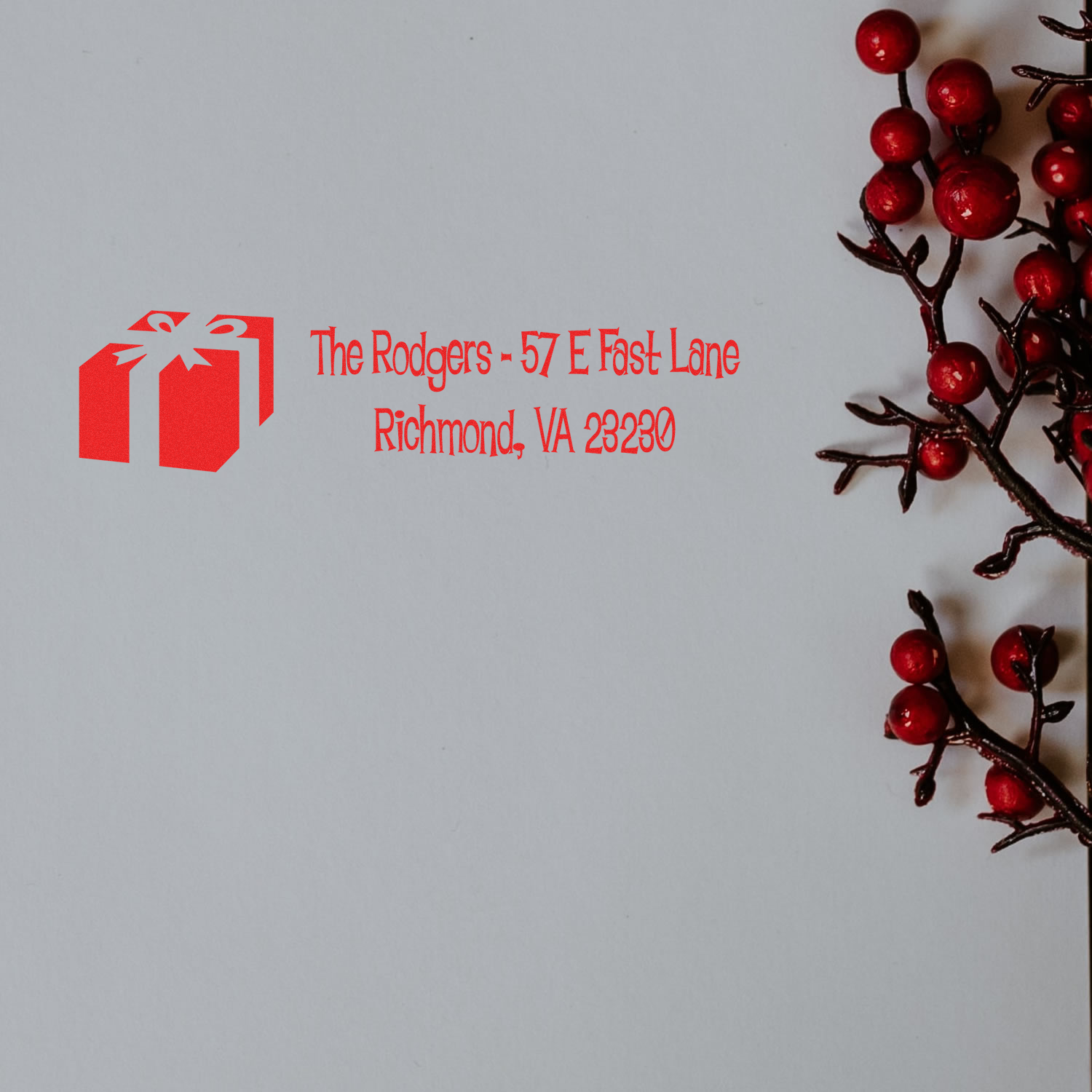 Custom Christmas return address rubber stamp with gift icon, The Rodgers, Richmond VA 23230.