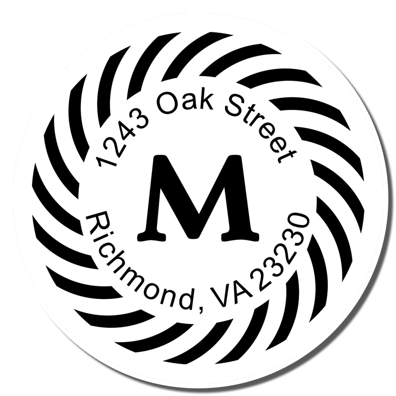 Personalized round rubber address stamp with monogram M and return address, 1243 Oak Street, Richmond, VA 23230.
