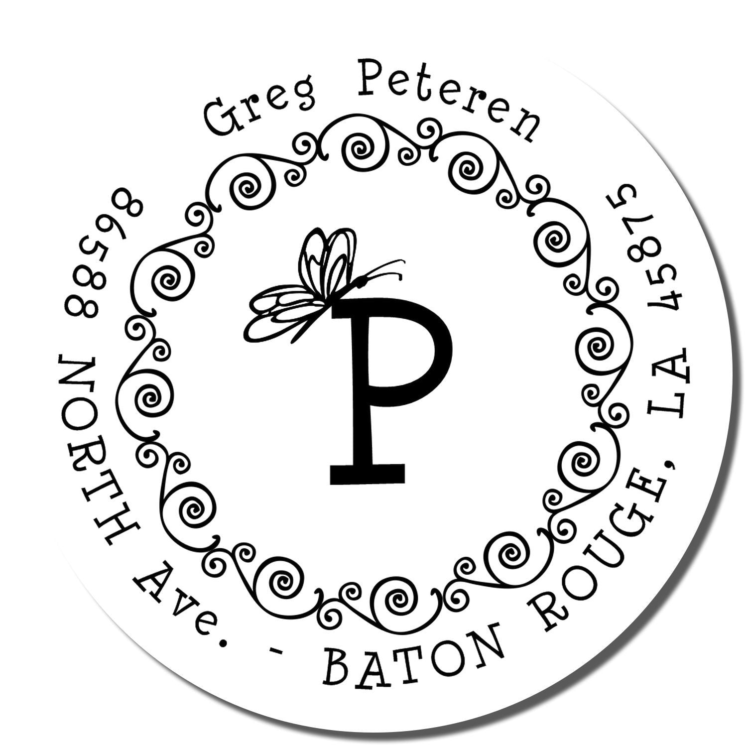 Custom return address rubber stamp with ornate monogram P, Greg Petersen name, and Baton Rouge, LA address.