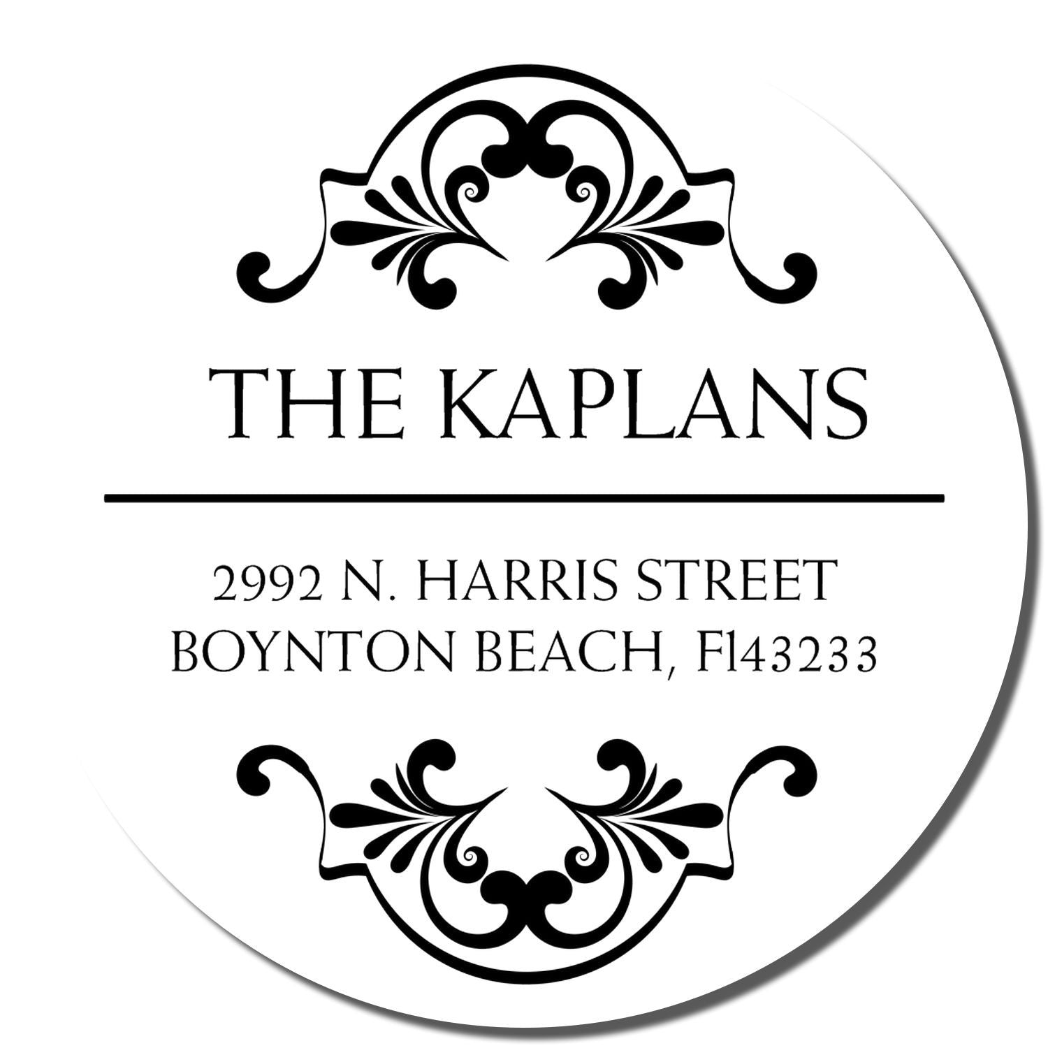 Custom return address rubber stamp for The Kaplans, featuring a personalized family name and address with decorative flourishes.