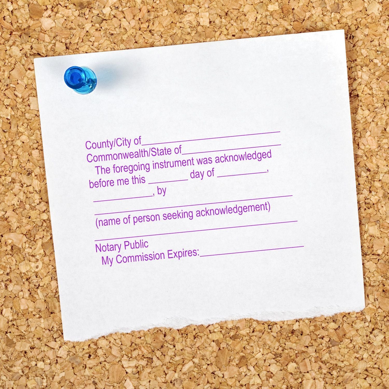 Blank notary public acknowledgment form pinned to a cork board, legal document template with signature lines and commission expiration.
