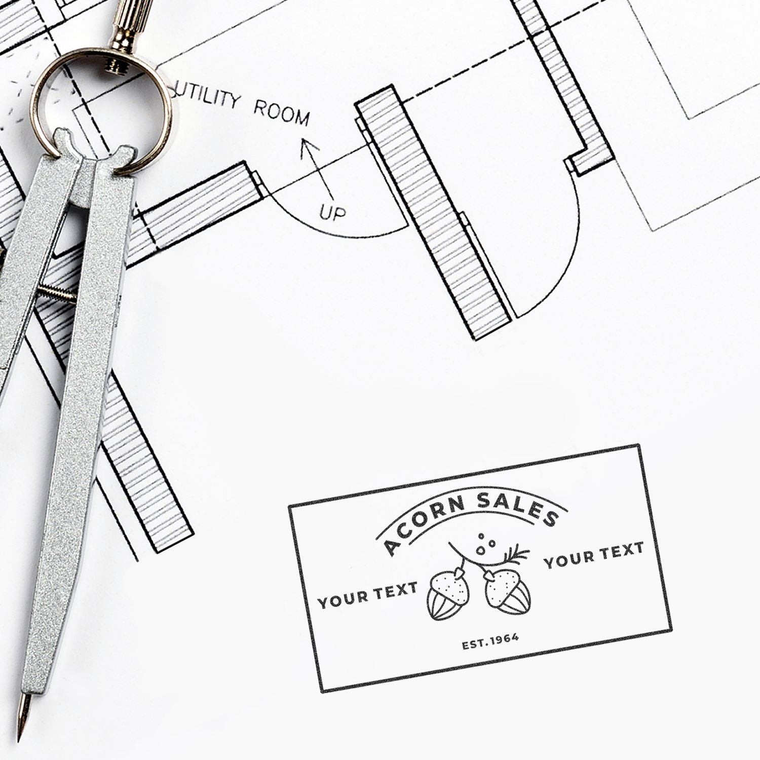 Architectural utility room blueprint with magnifying glass and key, featuring Acorn Sales custom text card for promotions.