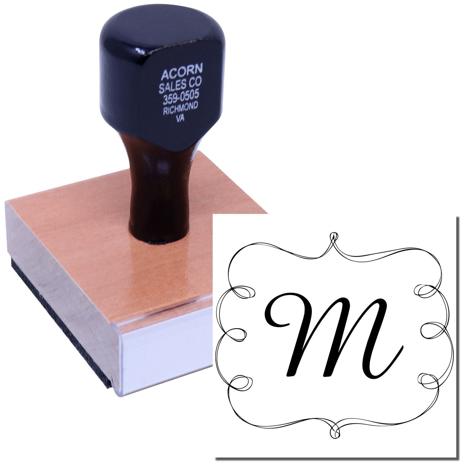 Custom M monogram rubber stamp with decorative frame for personalized stationery and branding.