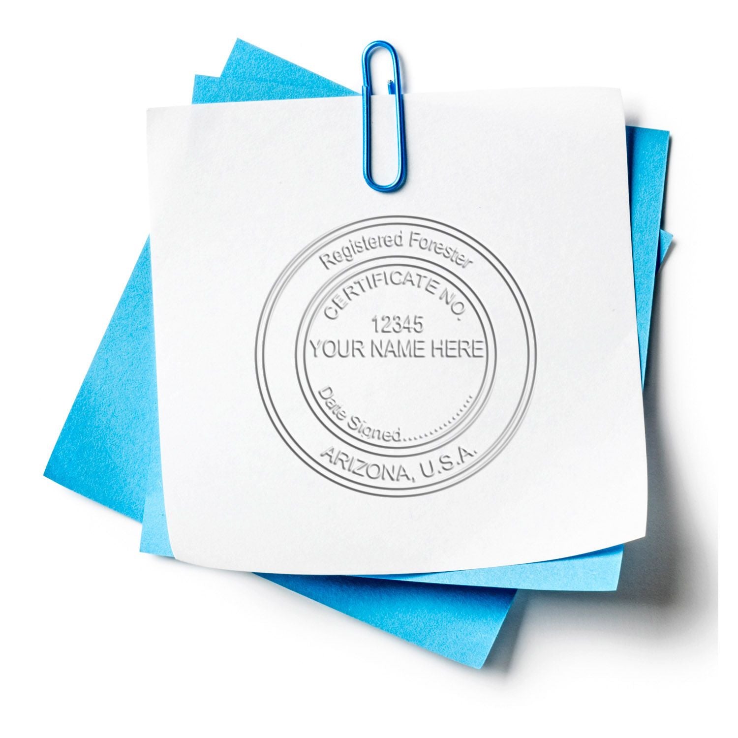 White paper with embossed Registered Forester certificate stamp clipped to blue sticky notes with a paperclip.