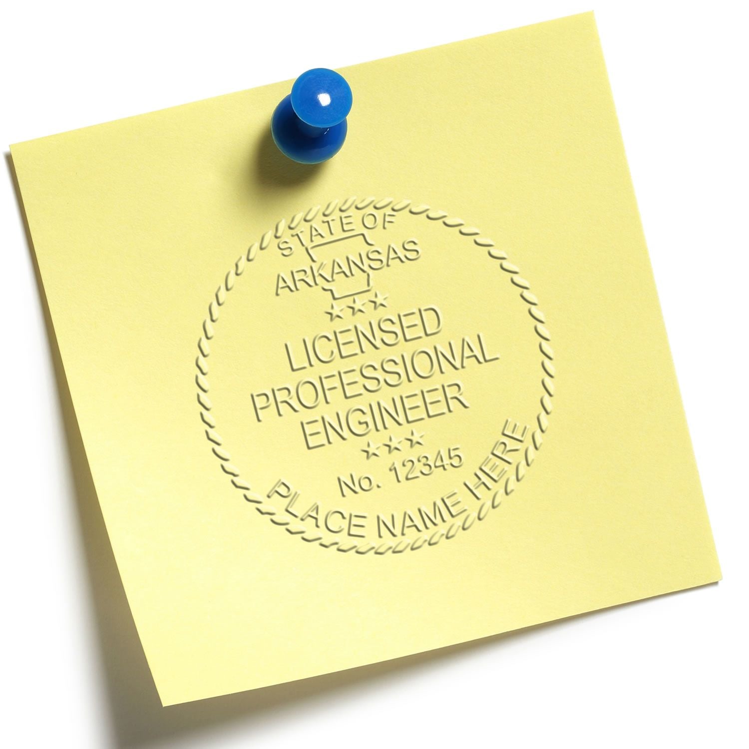 Arkansas Licensed Professional Engineer seal on yellow note pinned with blue pushpin.