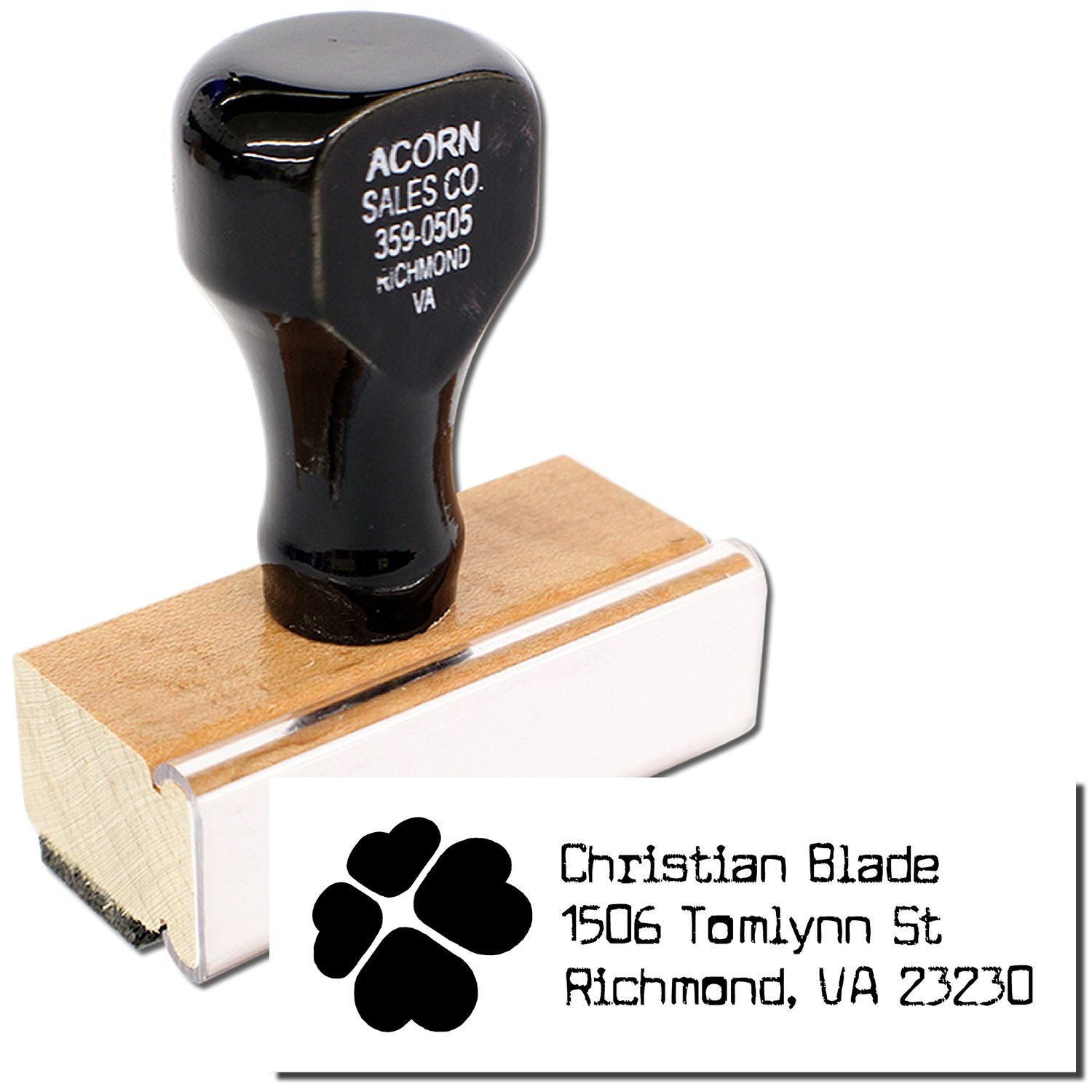 Custom rubber address stamp with paw print logo and return address for Christian Blade, Richmond, VA 23230.