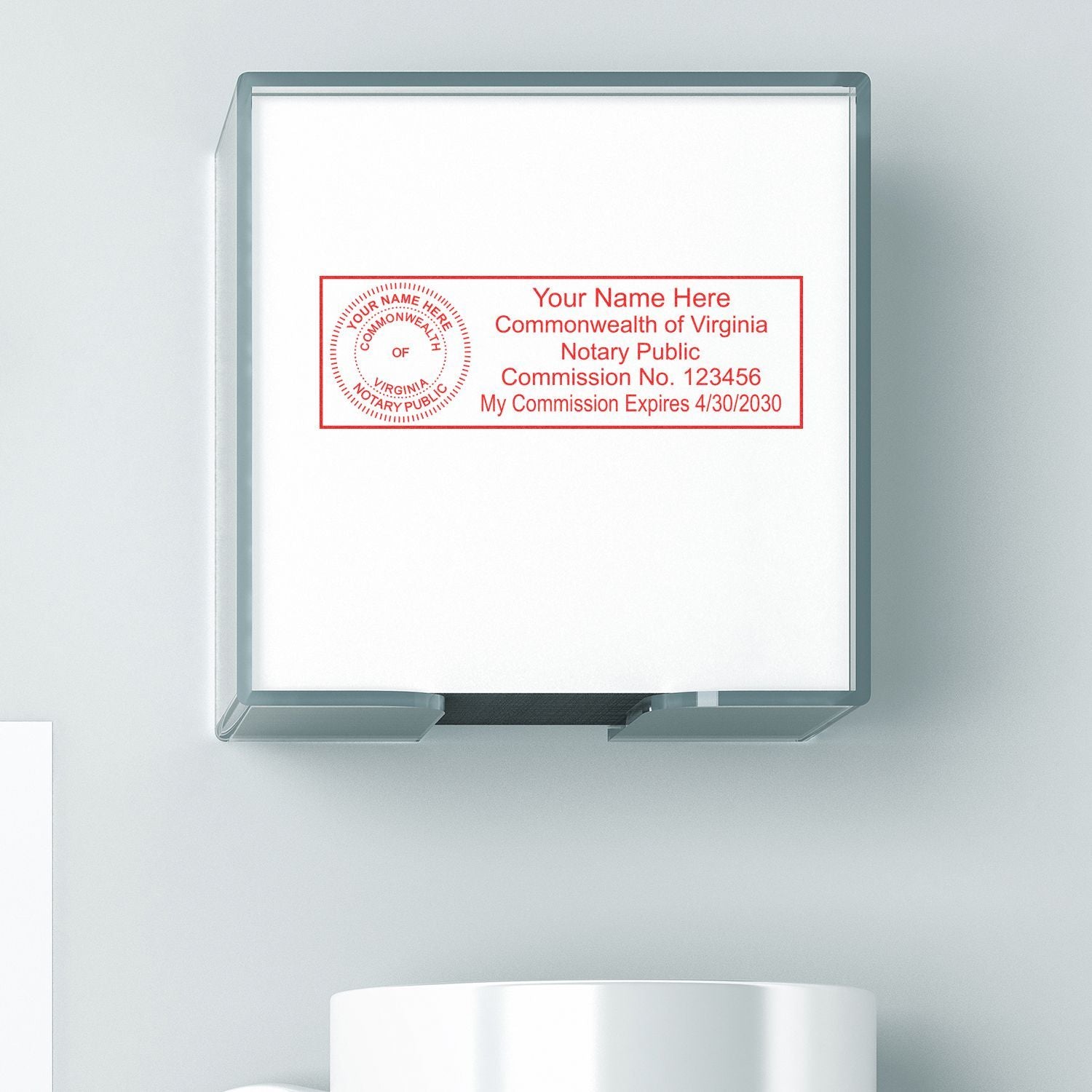 Virginia Notary Public seal stamp in clear desktop holder with commission number and expiration date.