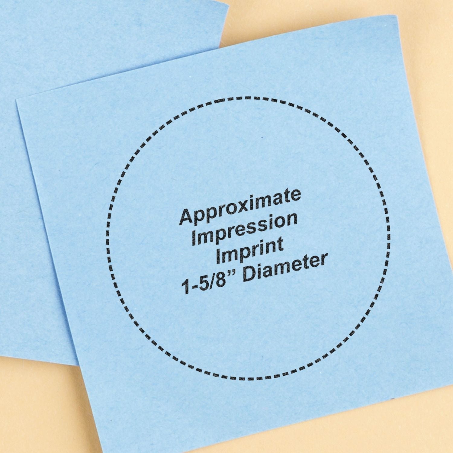 Blue approximate impression imprint template with dashed circle and 1-5/8-inch diameter guide on paper label.