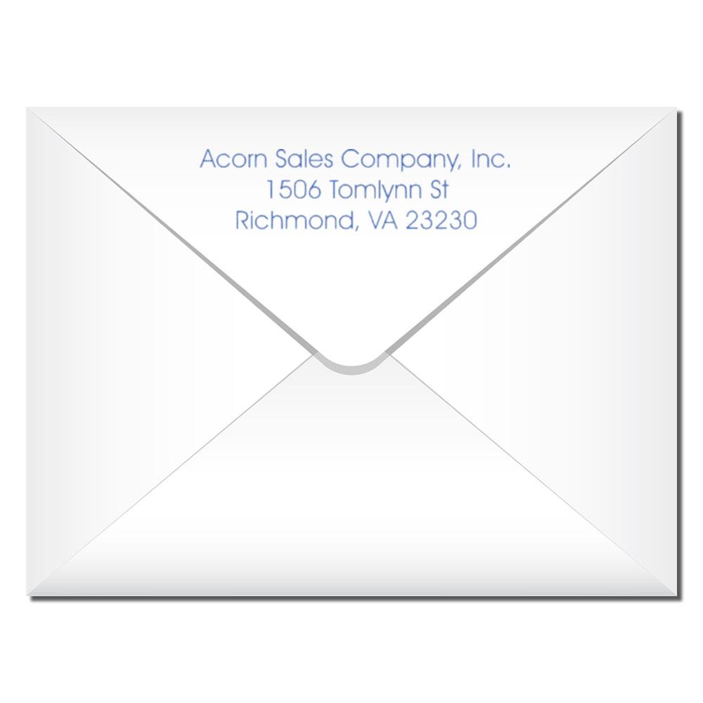 Custom address rubber stamp for envelopes with company name, street address, city, state, and ZIP code.