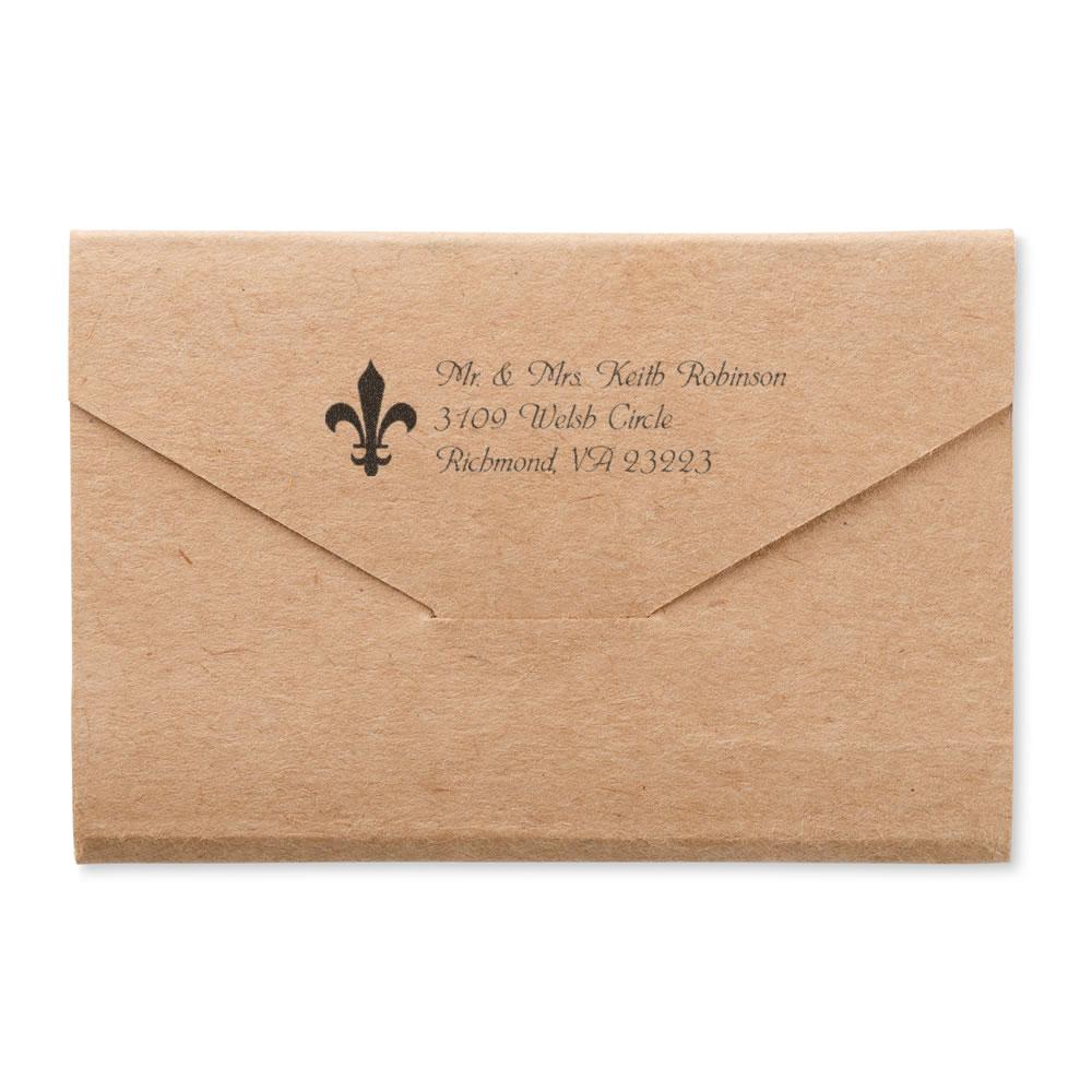 Personalized return address rubber stamp on kraft envelope with fleur-de-lis design for wedding invitations and mail