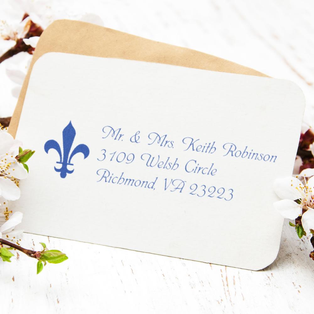 Custom rubber stamp return address on envelope with fleur-de-lis for Mr. & Mrs. Keith Robinson, Richmond, VA