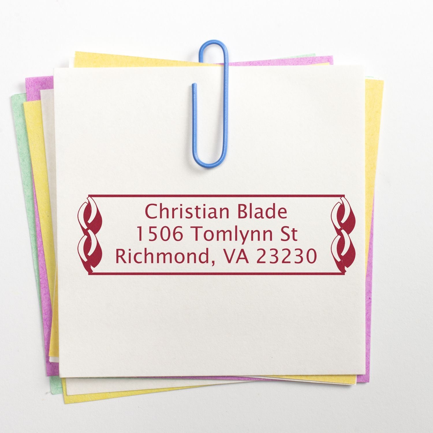 Custom address rubber stamp imprint on stacked notes, featuring name and Richmond, VA address for mailing.