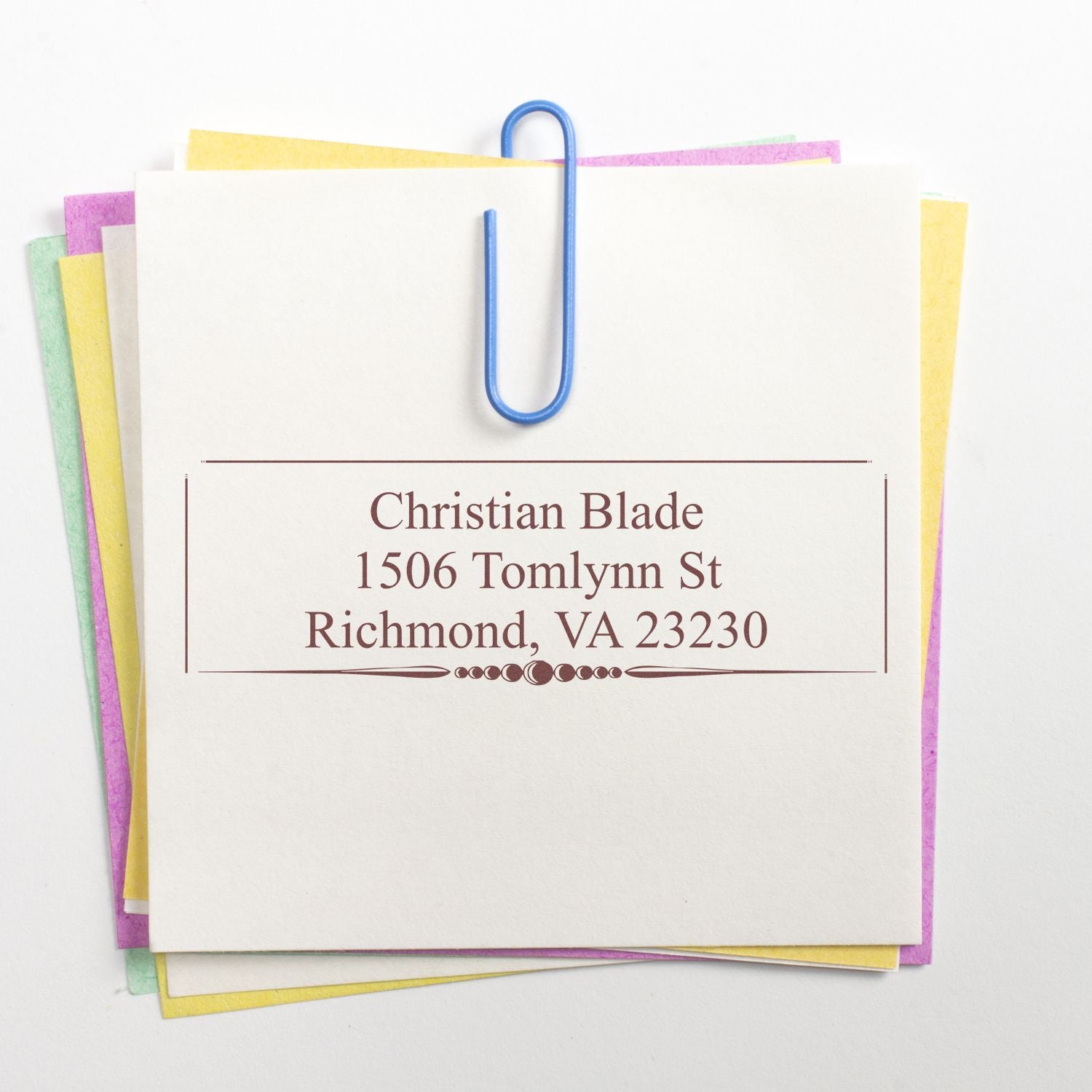 Custom return address rubber stamp for Christian Blade, Richmond, VA 23230 on stacked stationery.