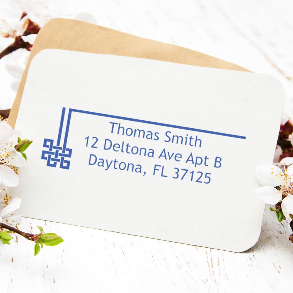 Custom return address rubber stamp on stationery, ideal for wedding invitations, business mail and personal correspondence.