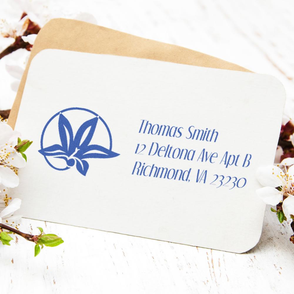 Custom rubber address stamp with floral monogram for envelopes, featuring Thomas Smith name and Richmond, VA return address.